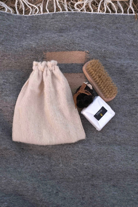 Handmade olive oil soap to hand-wash delicate wool items Wooden brush with natural bristles to de-pill and clean your garments Organic Incense to smoke over wool, protect it, and repel moths Short printed guide to Indigenous Wool Care